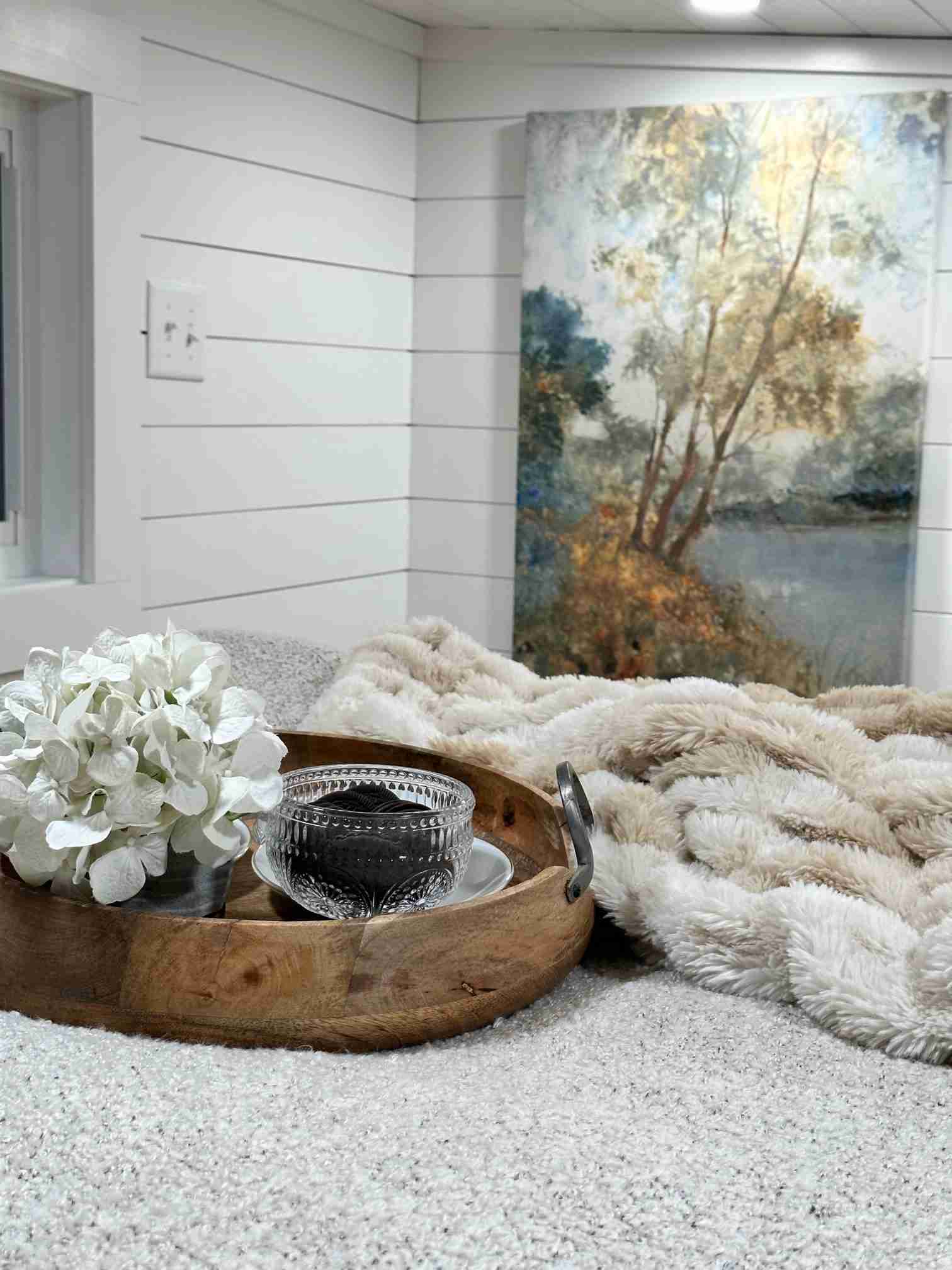 Decorative flower and grey blanket